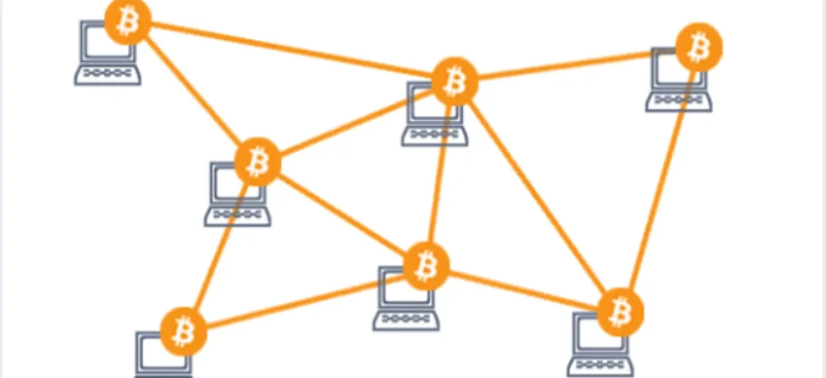 Rede P2P de computadores conectados por símbolos do Bitcoin, representando a descentralização e segurança das transações