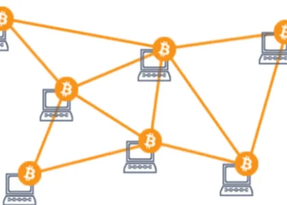 Rede P2P de computadores conectados por símbolos do Bitcoin, representando a descentralização e segurança das transações