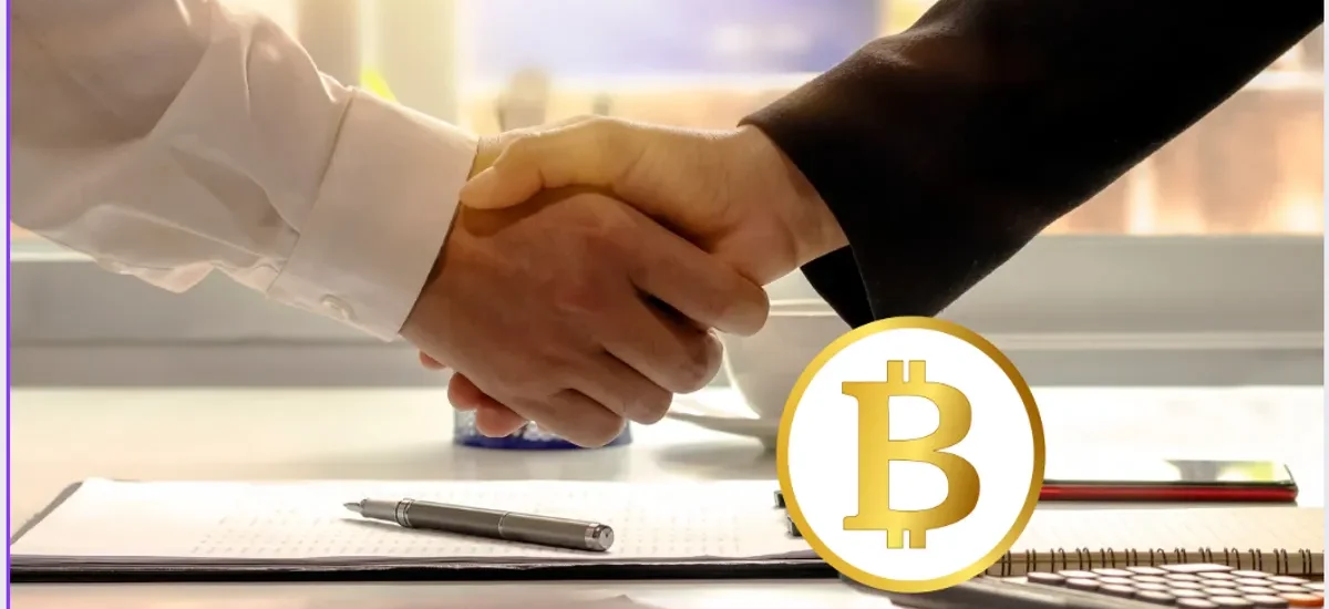 Duas pessoas apertando as mãos sobre contrato com símbolo do Bitcoin, representando herança e sucessão de criptoativos