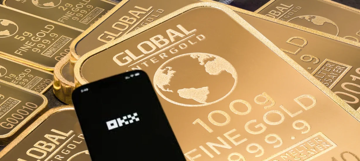 Cartão digital representando RWA lastreado em ouro na OKX, ilustrando a tokenização de ouro físico e a integração entre ativos do mundo real e o ecossistema cripto