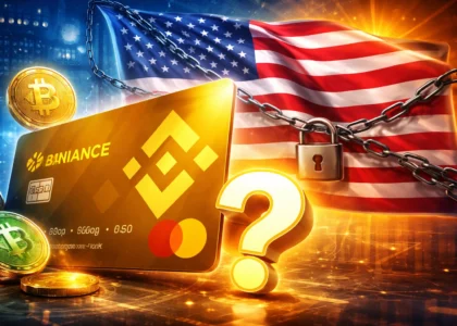 Hero image showing a Binance-style crypto card in the foreground, a large glowing question mark, and a prominent United States flag in the background wrapped with chains and a padlock, symbolizing uncertainty and restrictions around crypto cards in the U.S. in 2026.